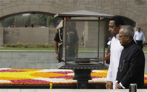 New Delhi: President-elect Pranab Mukherjee pays homage at Rajghat before taking oath as India's 13th President, in New Delhi on Wednesday. PTI  
