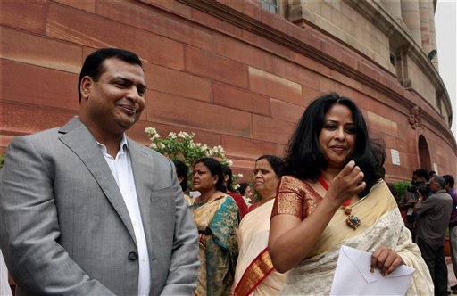 Pranab Mukherjee's daughter Sharmishta and son Indrajit Mukherjee along with other family members during swearing-in ceremony in the Central Hall of Parliament
