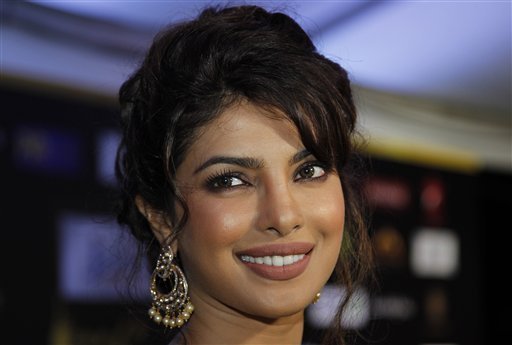 Bollywood actress Chitrangada Singh arrives on the 'green carpet' for the Jaypee International Indian Film Academy (IIFA) awards held on Saturday June 9, 2012 in Singapore<br/>
 
