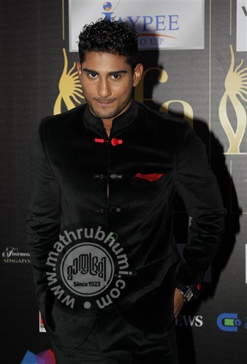 Bollywood actor Prateik Babbar arrives on the 'green carpet' for the Jaypee International Indian Film Academy (IIFA) awards held on Saturday June 9, 2012 in Singapore 
