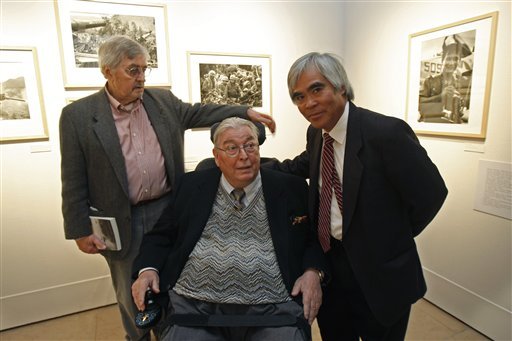 In this Tuesday Feb. 8, 2011 file photo, Richard Pyle, former Associated Press bureau chief in Saigon, left, Horst Faas, former AP chief photographer and photo editor in Saigon, center, and Nick Ut, former AP photographer in Saigon, right, pose at th
