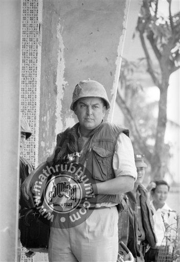  In this May 1968 file photo, Horst Faas, then Associated Press Saigon bureau photo chief, is pictured with his camera during the Second Offensive in Saigon, Vietnam. Faas, a prize-winning combat photographer who carved out new standards for covering
