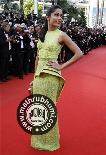 Actress Freida Pinto arrives for the screening of Rust and Bone at the 65th international film festival, in Cannes, southern France, Thursday, May 17, 2012<br/>
 
