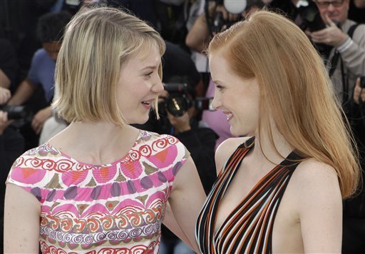 Actresses Mia Wasikowska, left and Jessica Chastain pose during a photo call for Lawless at the 65th international film festival, in Cannes, southern France, Saturday<br/>
 
