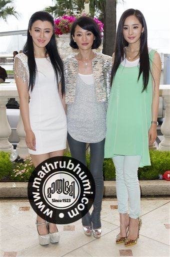 From left, Chinese actresses, Chen Ting Jia, Zhou Xun and Mini Yang pose during a photocall for Painted Skin II at the 65th international film festival, in Cannes, southern France, Saturday 
