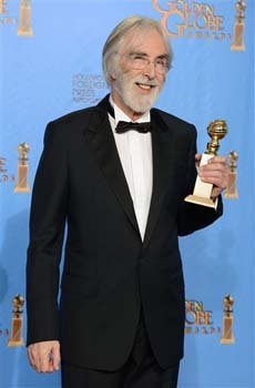 Director Michael Haneke poses with the award for best foreign language film for 'Amour' backstage at the 70th Annual Golden Globe Awards
