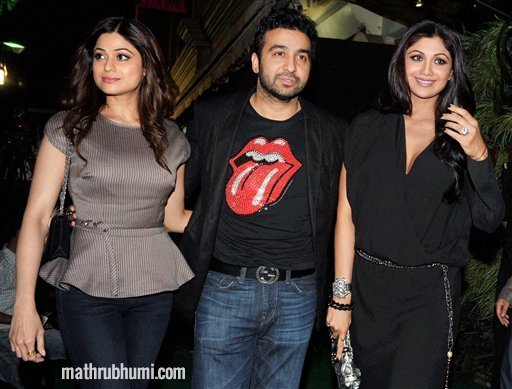 <br/>
Bollywood actress Shilpa Shetty with her husband Raj Kundra and sister Shamita Shetty during a promotional event in Mumbai on Saturday night   
