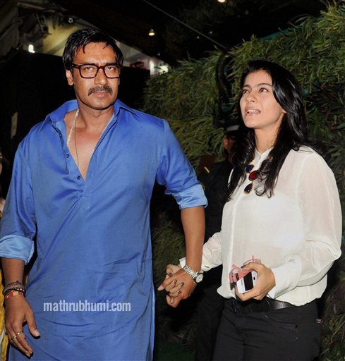 Mumbai: Bollywood Actor Ajay Devgn with wife Kajol during a promnotional event in Mumbai on Saturday night . PTI  
