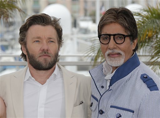 Actors Amitabh Bachchan, right, and Joel Edgerton pose for photographers during a photo call for The Great Gatsby at the 66th international film festival, in Cannes, southern France, Wednesday, May 15, 2013. (AP P<br/>
 

