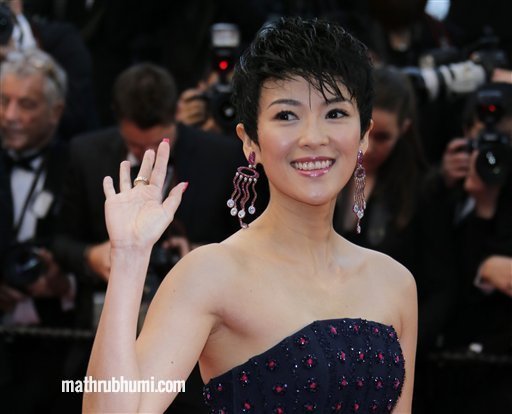 Actress Zhang Ziyi arrives for the opening ceremony and the screening of The Great Gatsby at the 66th international film festival, in Cannes, southern France, Wednesday, May 15, 2013. (AP Photo/Francois Mori) 

