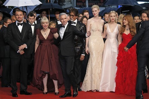 <br/>
From left, actors Leonardo DiCaprio, production designer Catherine Martin, director Baz Luhrmann, actors Amitabh Bachchan, Elizabeth Debicki, Carey Mulligan and Isla Fischer walk the red carpet for the opening ceremony and the screening of The Great Gatsby at the 66th international film festival, in Cannes, southern France, Wednesday, May 15, 2013. (AP Photo/Francois Mori) 
